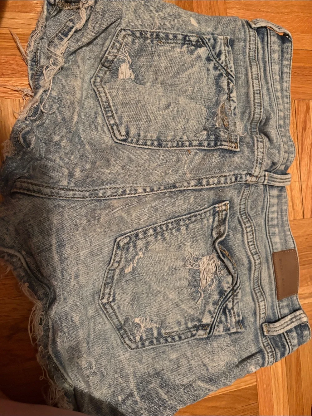 Buckle Light Blue Distressed Denim Shorts